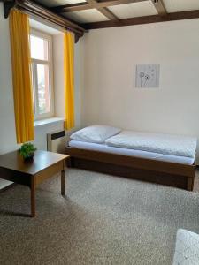 Postel nebo postele na pokoji v ubytování Penzion Breuer