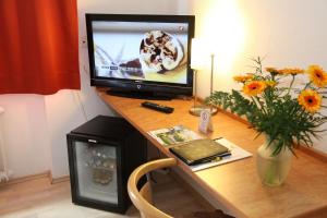 En TV eller et underholdningssystem på Hotel Novostar