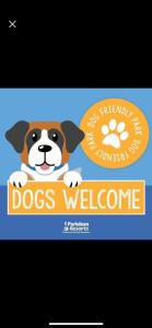 a dog welcome banner with a dog welcome sign at Park Dean Morcambe in Bare