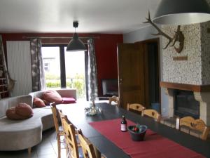 Posezení v ubytování Gîte Les Framboisiers