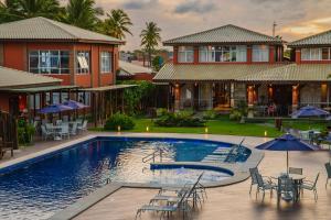 Bazén v ubytování Hotel Boutique & Spa Ponta de Inhambupe by Slaviero Hotéis nebo v jeho okolí