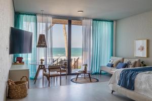 Postel nebo postele na pokoji v ubytování Saline Taíba Boutique Beach Hotel + 41 fotografií