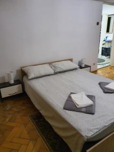Postel nebo postele na pokoji v ubytování RazDav Straja Central + 6 fotografií