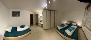 Voodi või voodid majutusasutuse Hotel Péz Ault toas