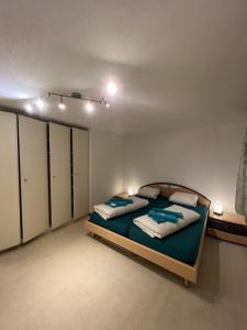 Voodi või voodid majutusasutuse Hotel Péz Ault toas