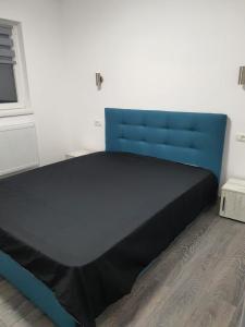 Postel nebo postele na pokoji v ubytování RazDav Delux Straja Central