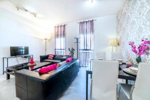 A television and/or entertainment centre at Apartamento La Salle