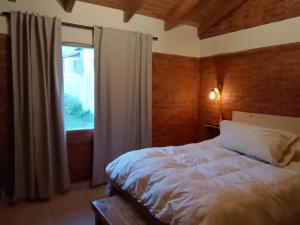 Postel nebo postele na pokoji v ubytování Anlupa casa