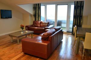 Posezení v ubytování Carrick Plaza Suites and Apartments