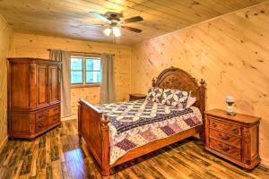 A bed or beds in a room at Scenic Trade Cabin with Deck Near Boone and App State!