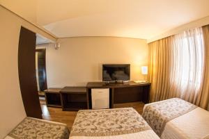 Postel nebo postele na pokoji v ubytování Hotel Campo Largo Comfort