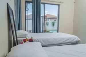 Postel nebo postele na pokoji v ubytování Ellen Topo