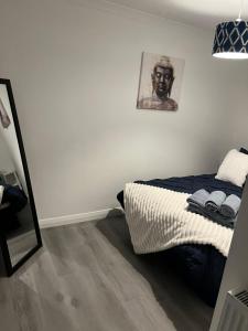 Ένα ή περισσότερα κρεβάτια σε δωμάτιο στο Rhyl beach town apartment