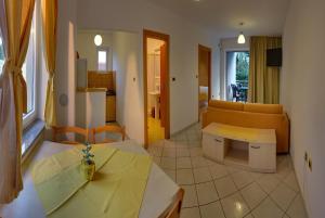Posedenie v ubytovaní Vis a Vis Apartments