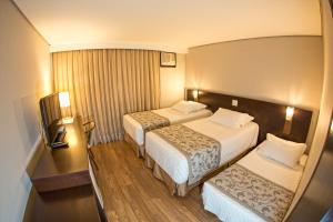Postel nebo postele na pokoji v ubytování Hotel Campo Largo Comfort