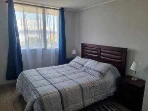 Krevet ili kreveti u jedinici u okviru objekta Departamento en Tome, Condominio Vista Bahia