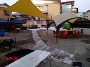 a tent is set up outside of a building at GuestHouse YADOYA - Vacation STAY 08450v in Tokamachi