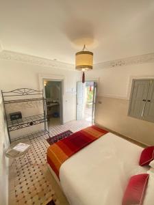 Postel nebo postele na pokoji v ubytování Riad magnolia privé