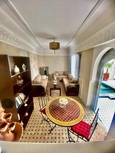 Posezení v ubytování Riad magnolia privé