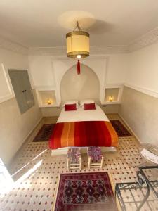 Postel nebo postele na pokoji v ubytování Riad magnolia privé