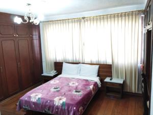 Postel nebo postele na pokoji v ubytování Hostal La Catolica