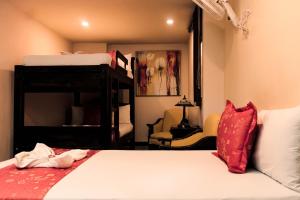 Voodi või voodid majutusasutuse Hotel Plaza Garibaldi toas