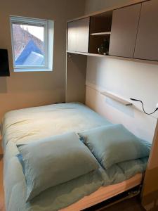 Posteľ alebo postele v izbe v ubytovaní Cambrai:studio style loft