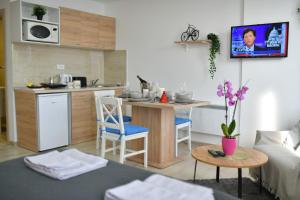 Kjøkken eller kjøkkenkrok på West in apartments
