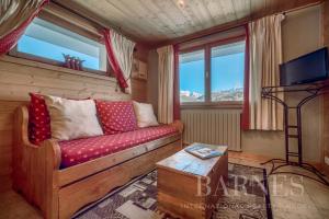 TV a/nebo společenská místnost v ubytování Apartments in Chalet Nessa