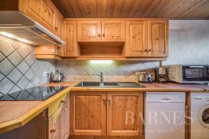 Kuchyň nebo kuchyňský kout v ubytování Apartments in Chalet Nessa