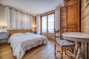 Postel nebo postele na pokoji v ubytování Apartments in Chalet Nessa