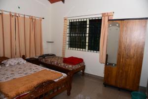 Mynd úr myndasafni af Mourya Homestay - 2BH, Estate, Balcony í Chikmagalūr