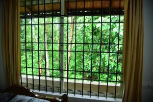 Mynd úr myndasafni af Mourya Homestay - 2BH, Estate, Balcony í Chikmagalūr