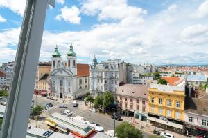 Nespecifikovaný výhled na destinaci Vídeň nebo výhled na město při pohledu z aparthotelu