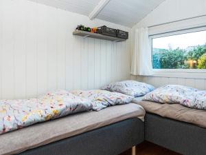Krevet ili kreveti u jedinici u okviru objekta Holiday home Juelsminde LXXXVII