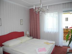 Postel nebo postele na pokoji v ubytování Hotel Rosner
