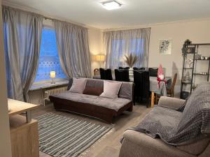Χώρος καθιστικού στο Schöne Wohnung mit dem Garten