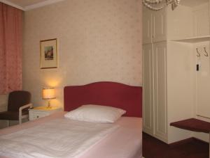 Postel nebo postele na pokoji v ubytování Hotel Rosner