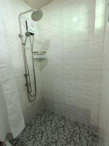 A bathroom at VickyBella's FUNadise Private Resort