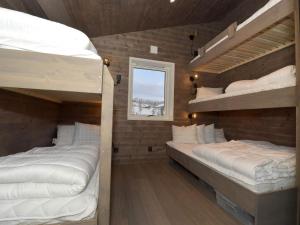 Poschodová posteľ alebo postele v izbe v ubytovaní Holiday home IDRE III