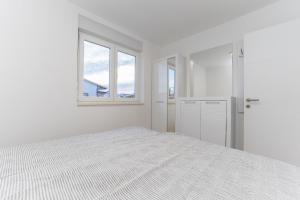 Łóżko lub łóżka w pokoju w obiekcie Apartment Losacker