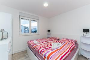 Łóżko lub łóżka w pokoju w obiekcie Apartment Losacker