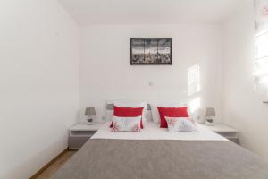 Apartments Kovacevic tesisinde bir odada yatak veya yataklar