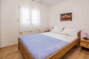 Apartments Galic tesisinde bir odada yatak veya yataklar