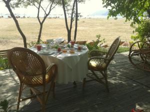 Un restaurant sau alt loc unde se poate mânca la Bellerofon Beach Otel