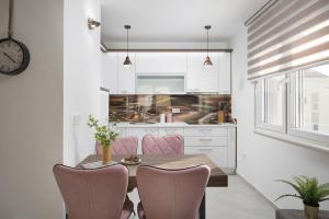 Kuchyň nebo kuchyňský kout v ubytování Apartments Vista Exclusive
