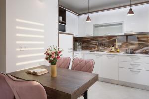 Kuchyň nebo kuchyňský kout v ubytování Apartments Vista Exclusive