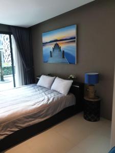 Postel nebo postele na pokoji v ubytování Emerald Terrace Patong + 81 fotografií