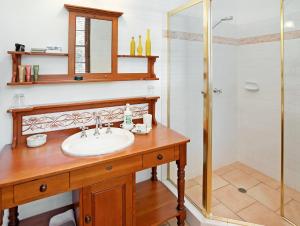 a bathroom with a sink and a shower at Montville Boutique BnB in Montville