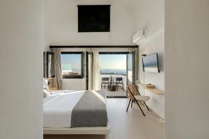 Postel nebo postele na pokoji v ubytování Onyx Hotel & Suites + 37 fotografií